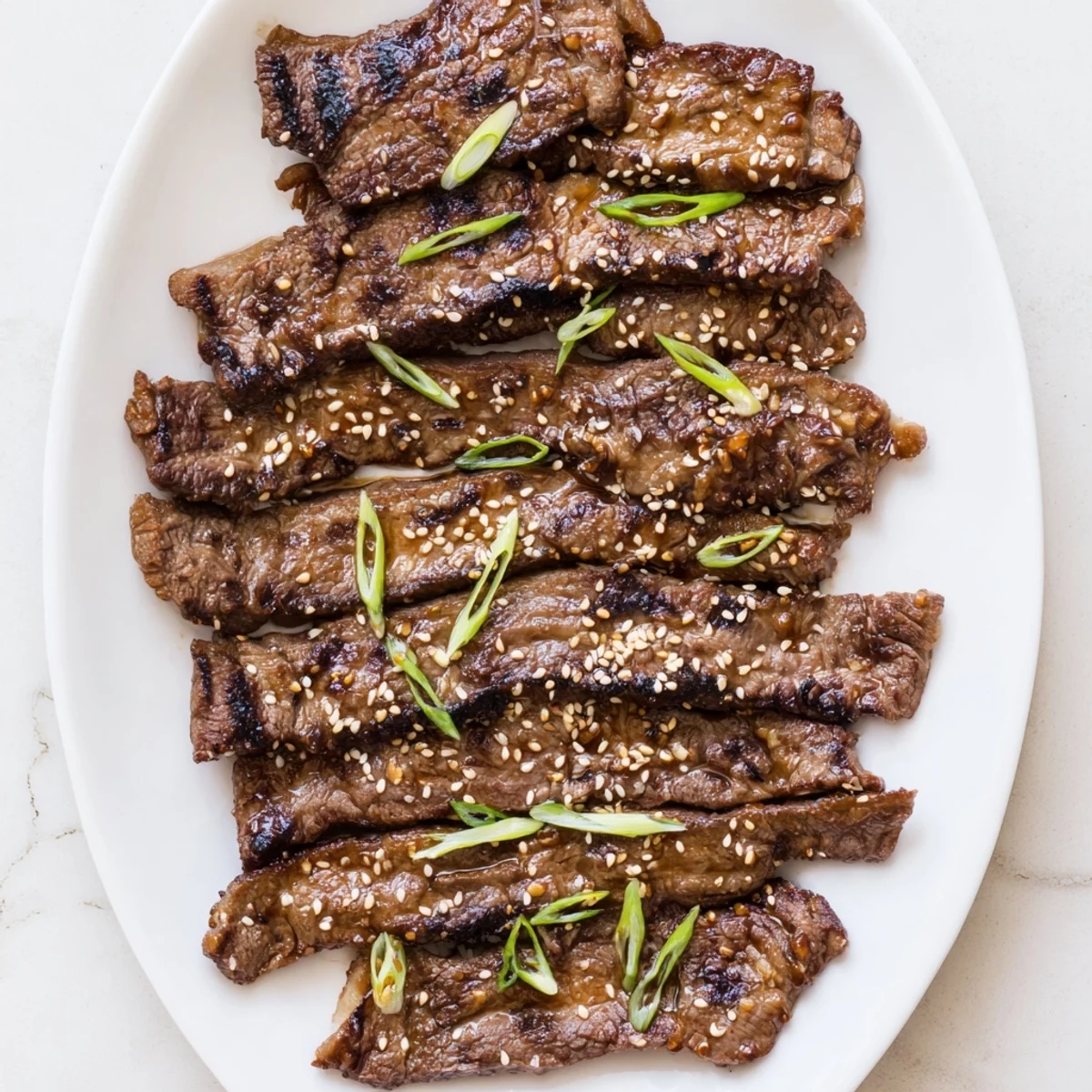 Succulent Korean Galbi beef short ribs grilled to smoky perfection with glossy marinade coating
