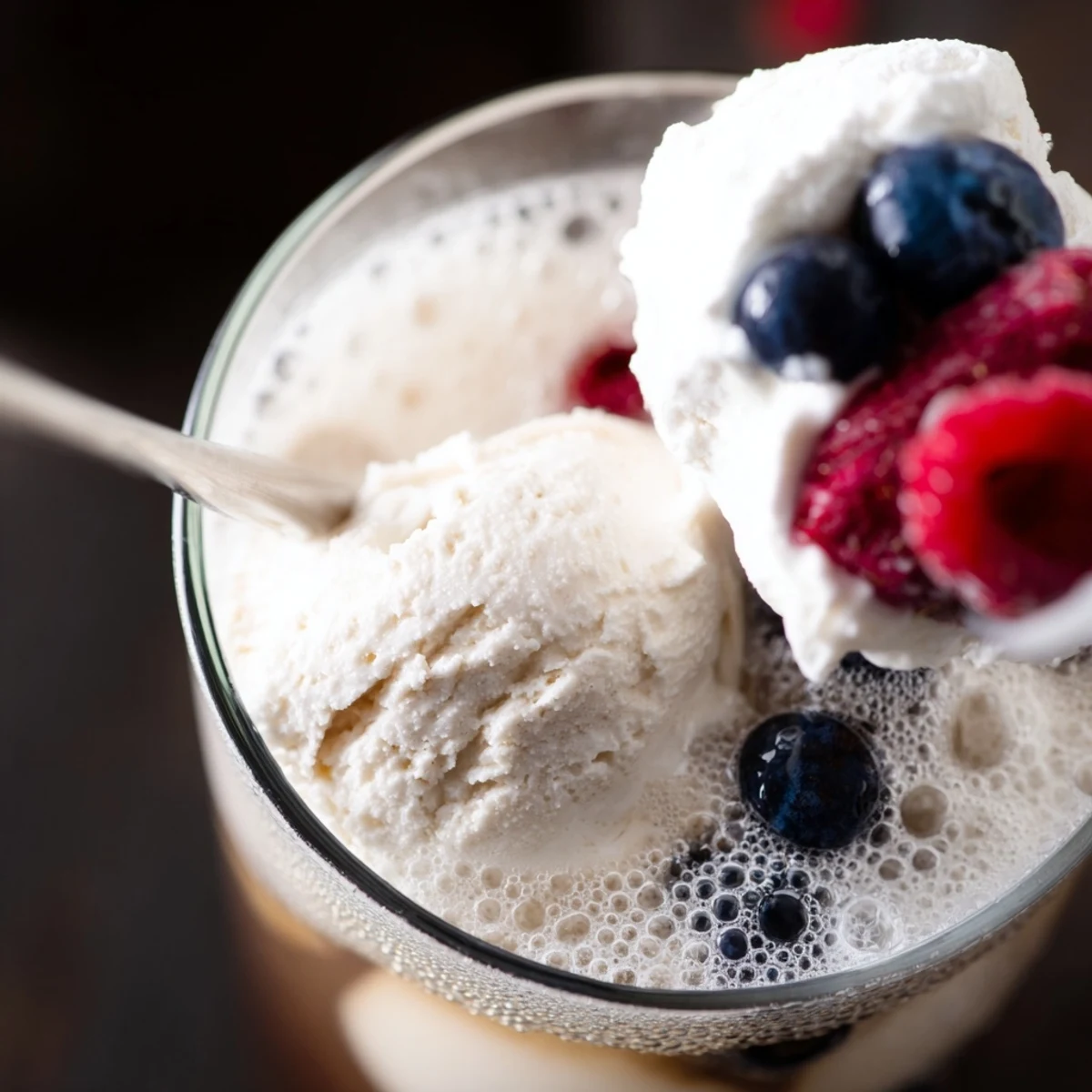 Guilt-free keto Rebel floats featuring vanilla ice cream scoops topped with sugar-free whipped cream