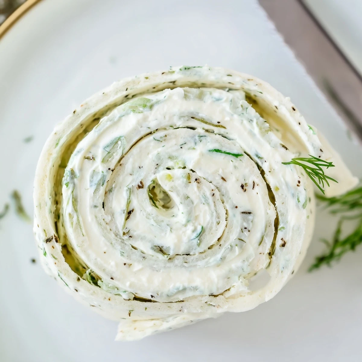 Pickle Dip Pinwheels sliced into rounds, perfect cold appetizer for gatherings