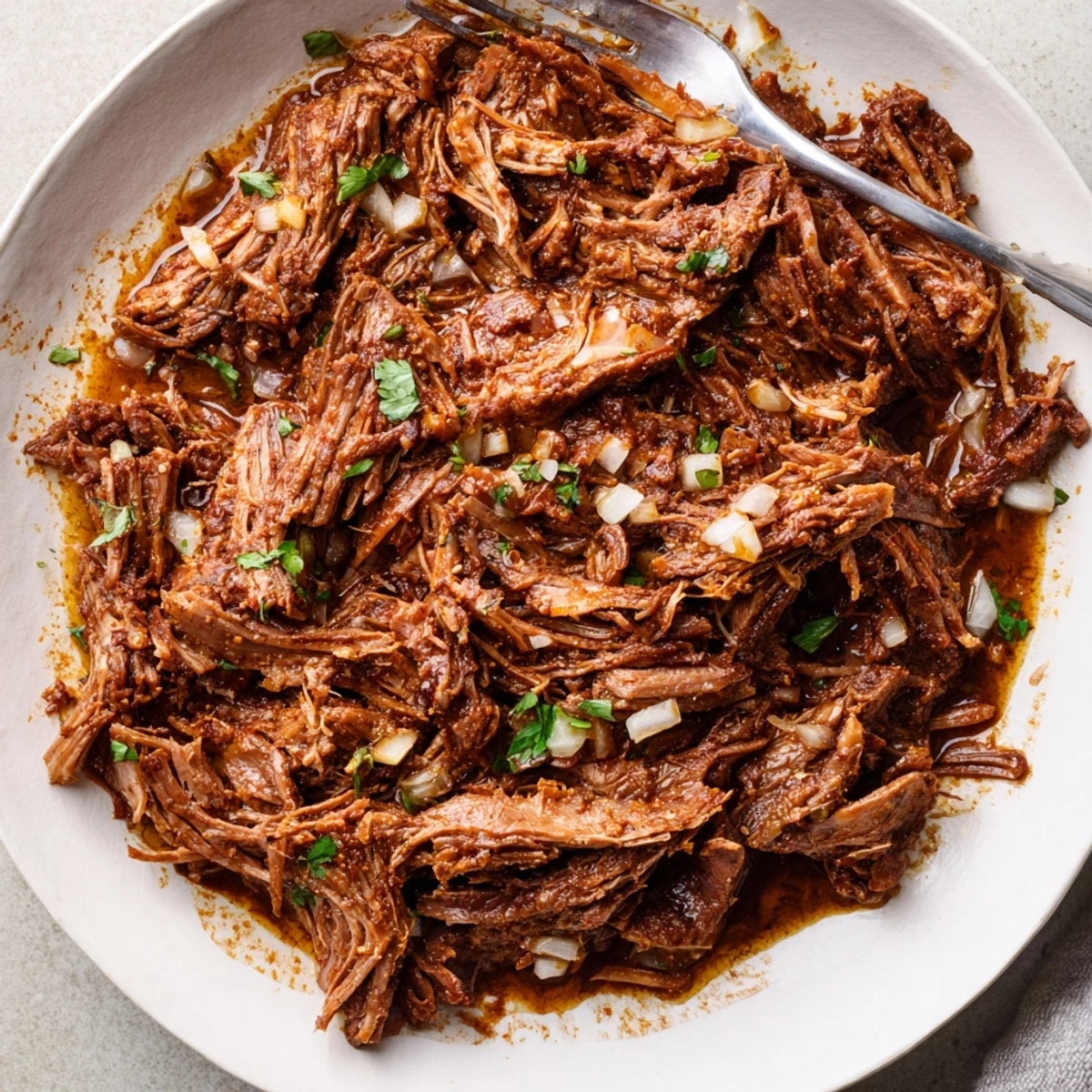 Weeknight Slow Cooker Beef Barbacoa simmered eight hours, fragrant, melt-in-mouth